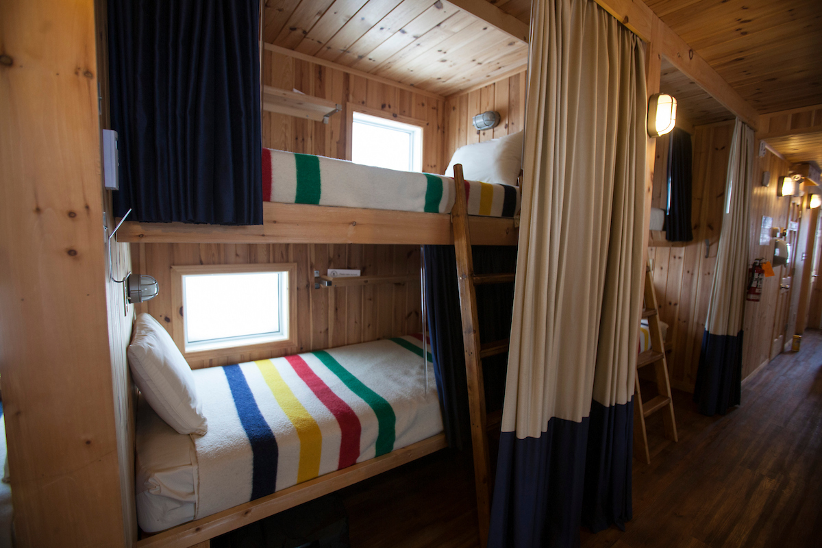 Tundra Buggy Lodge accommodations. Each feature two layers of privacy curtains. 